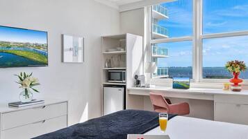 Iron/ironing board, travel crib, WiFi, bed sheets