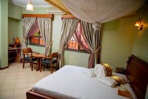Blackout drapes, iron/ironing board, free WiFi, bed sheets