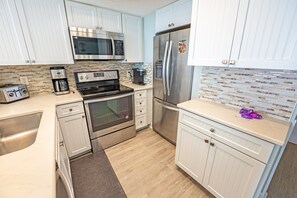 Fridge, microwave, coffee/tea maker, toaster