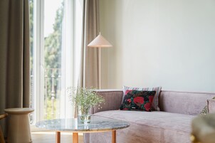 3 Bedroom Apartment with Balcony | Living area | 45-inch flat-screen TV with cable channels, TV