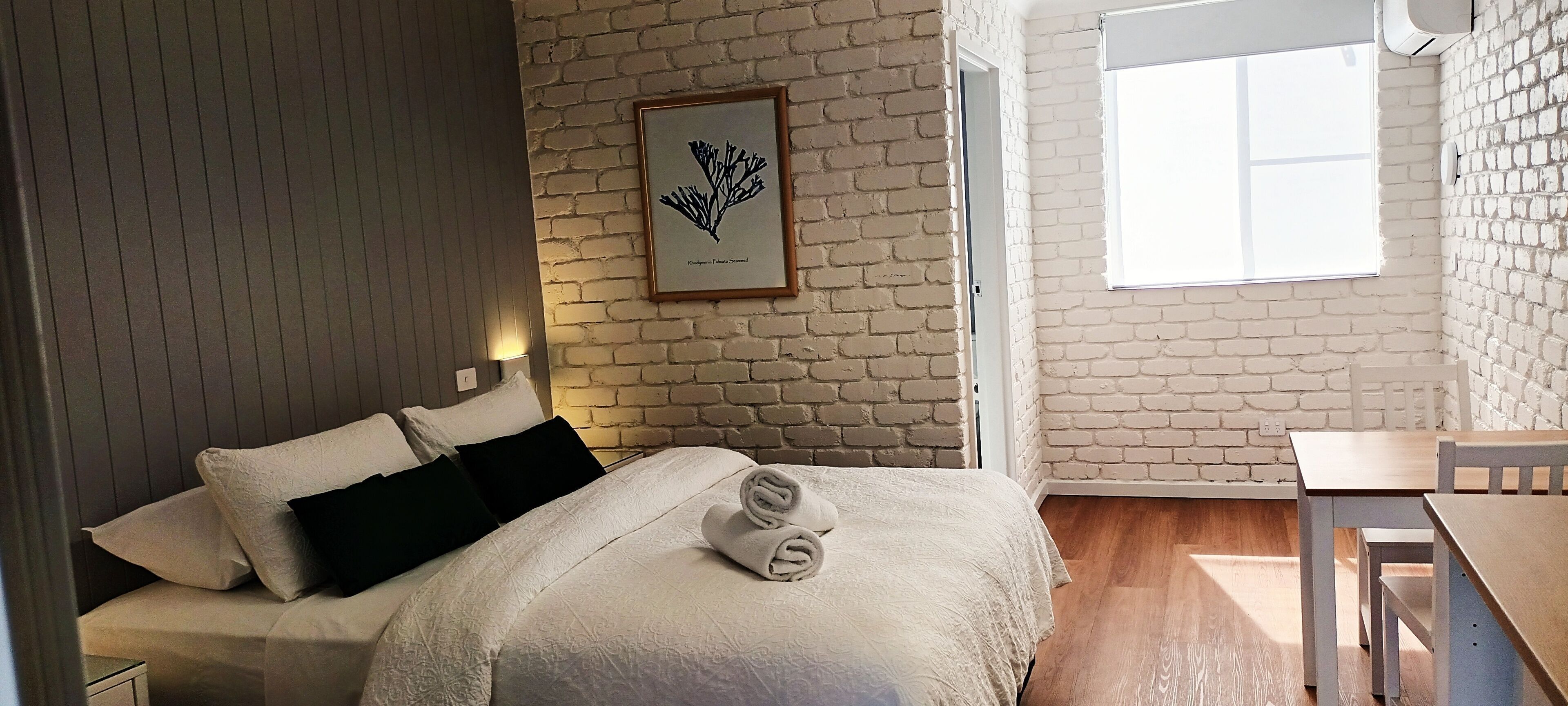 Blackout drapes, iron/ironing board, travel crib, free WiFi