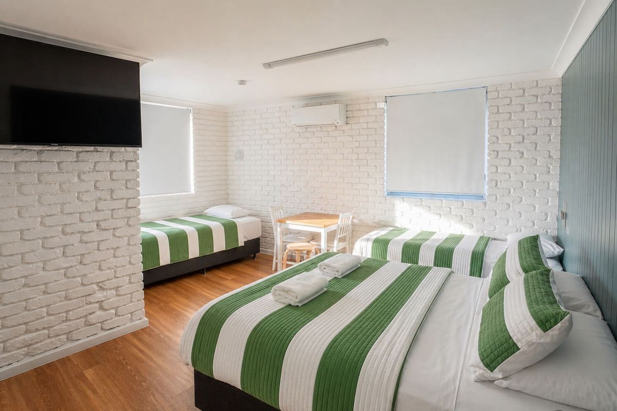 Family Queen Room 3 | Blackout drapes, iron/ironing board, travel crib, free WiFi