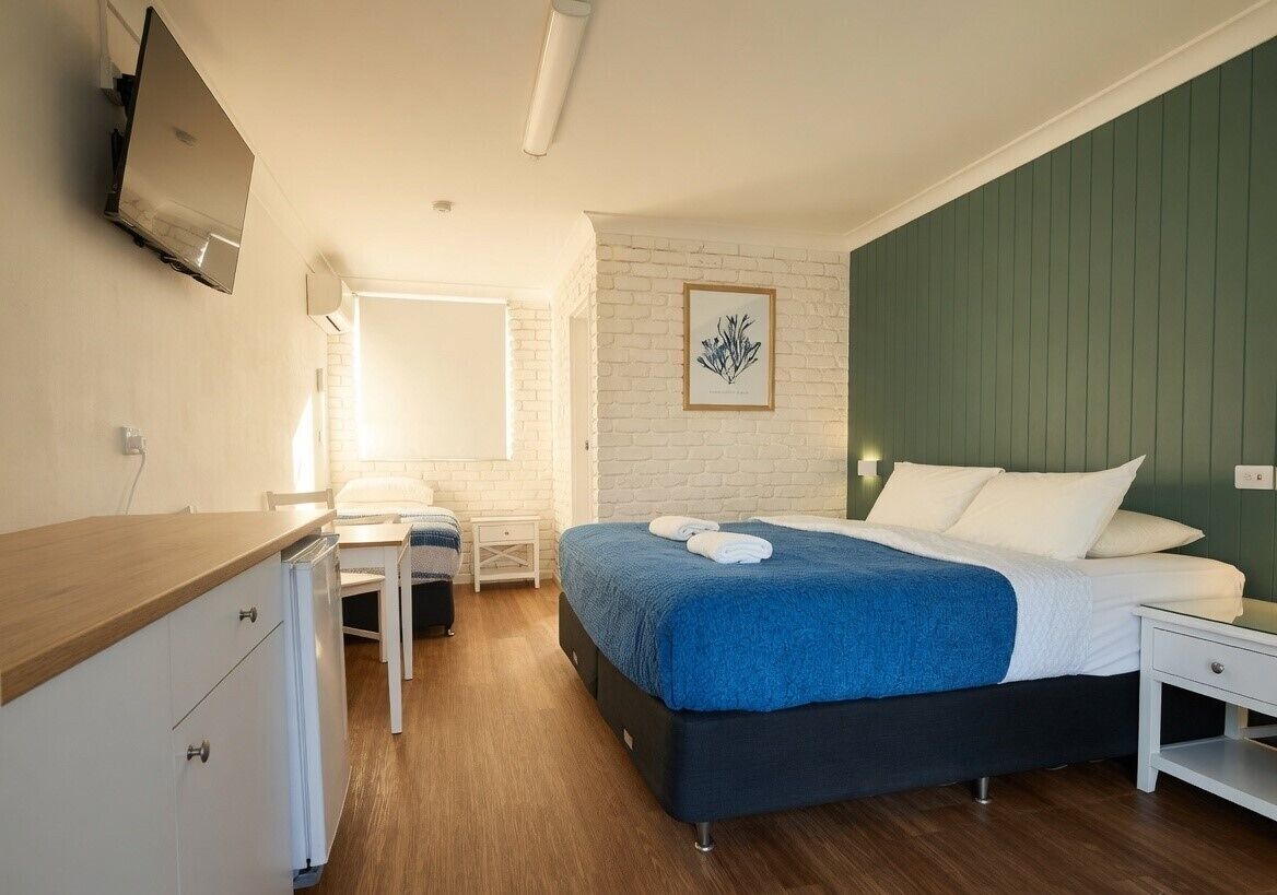 Family King Room 4 | Blackout drapes, iron/ironing board, travel crib, free WiFi