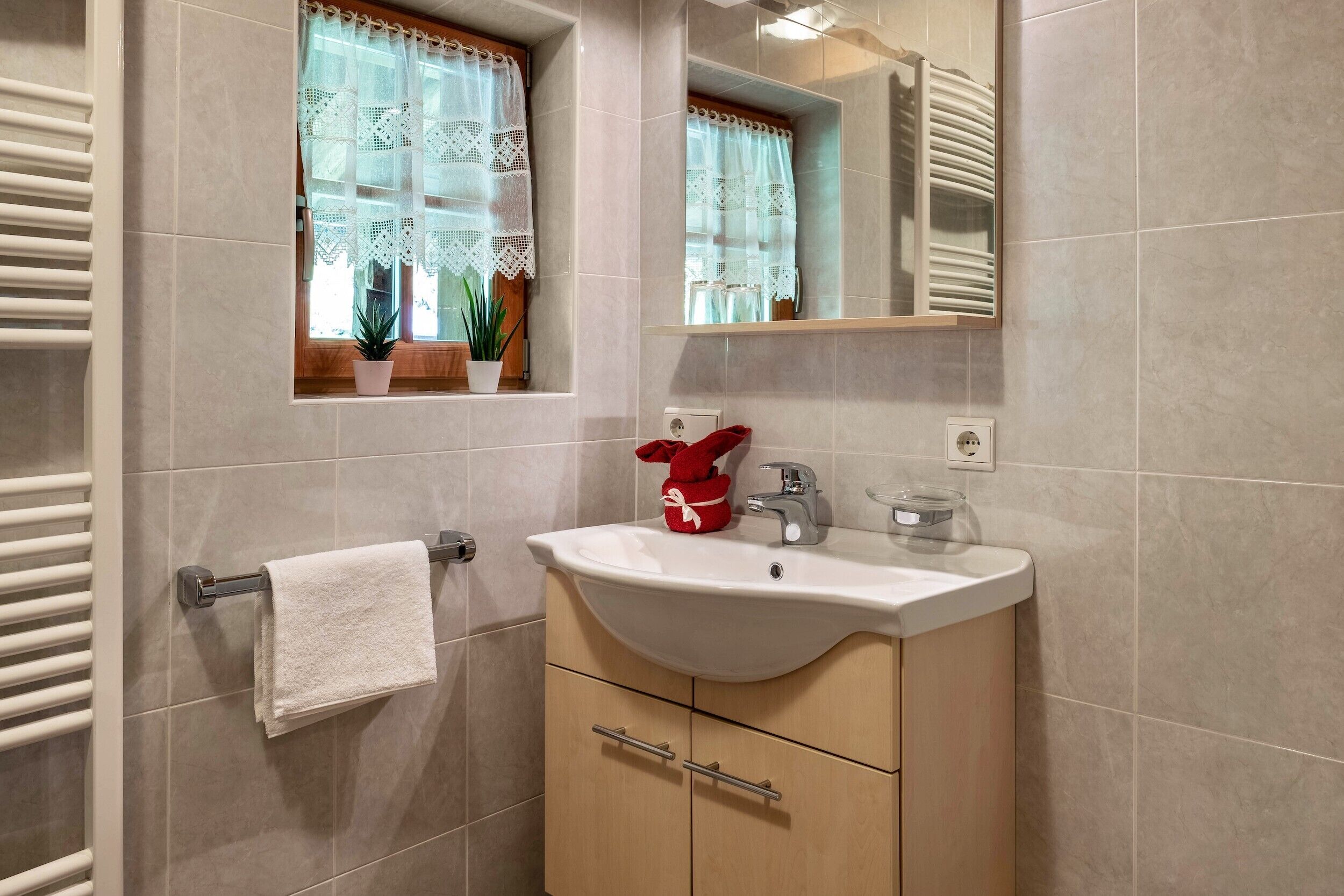 Bathtub, hair dryer, towels