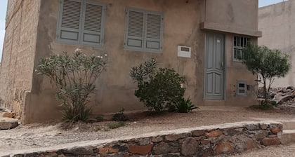 Characteristic old country house in the middle of the desert