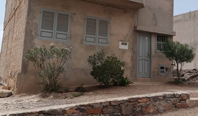 Characteristic old country house in the middle of the desert