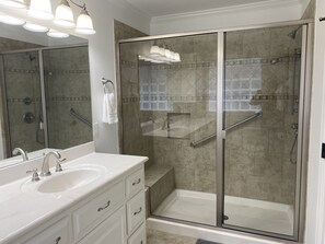 Combined shower/tub, hair dryer, towels, toilet paper
