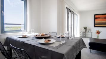 Exclusive Apartment | Living area | 50-inch Smart TV with digital channels, TV, streaming services