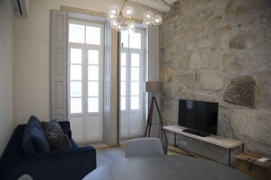 Family Studio, 2 Bedrooms, Terrace, Courtyard View | Living area | 40-inch Smart TV with cable channels, TV