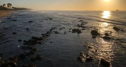 Newly decorated 3 Bedroom Family Apartment with direct beach access .