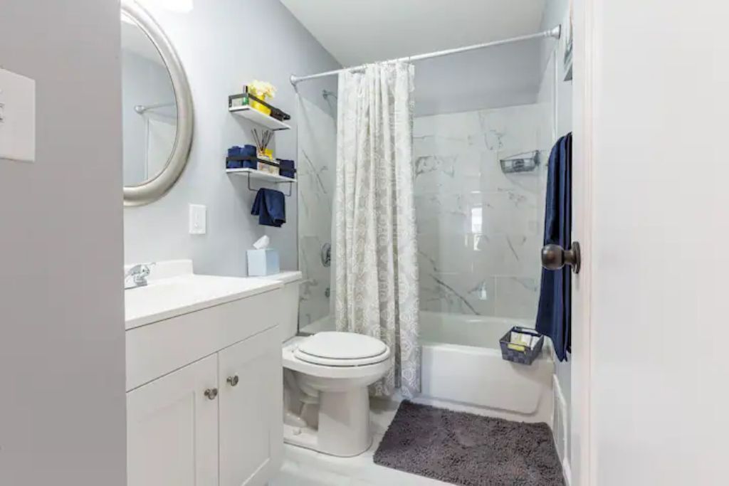 Combined shower/tub, hair dryer, towels, soap