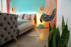 1 bedroom, desk, iron/ironing board, travel crib