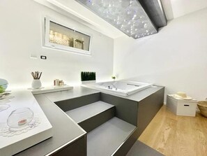 Combined shower/tub, jetted tub, hair dryer, bidet
