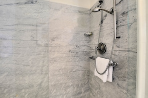 Bathtub, hair dryer, towels
