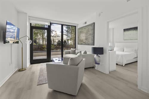 Deluxe Apartment, 1 Bedroom, Balcony (Room décor/layout/colors vary by unit) | Living room | 42-inch flat-screen TV with cable channels, TV, Netflix