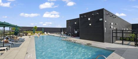 Seasonal outdoor pool, pool umbrellas, sun loungers