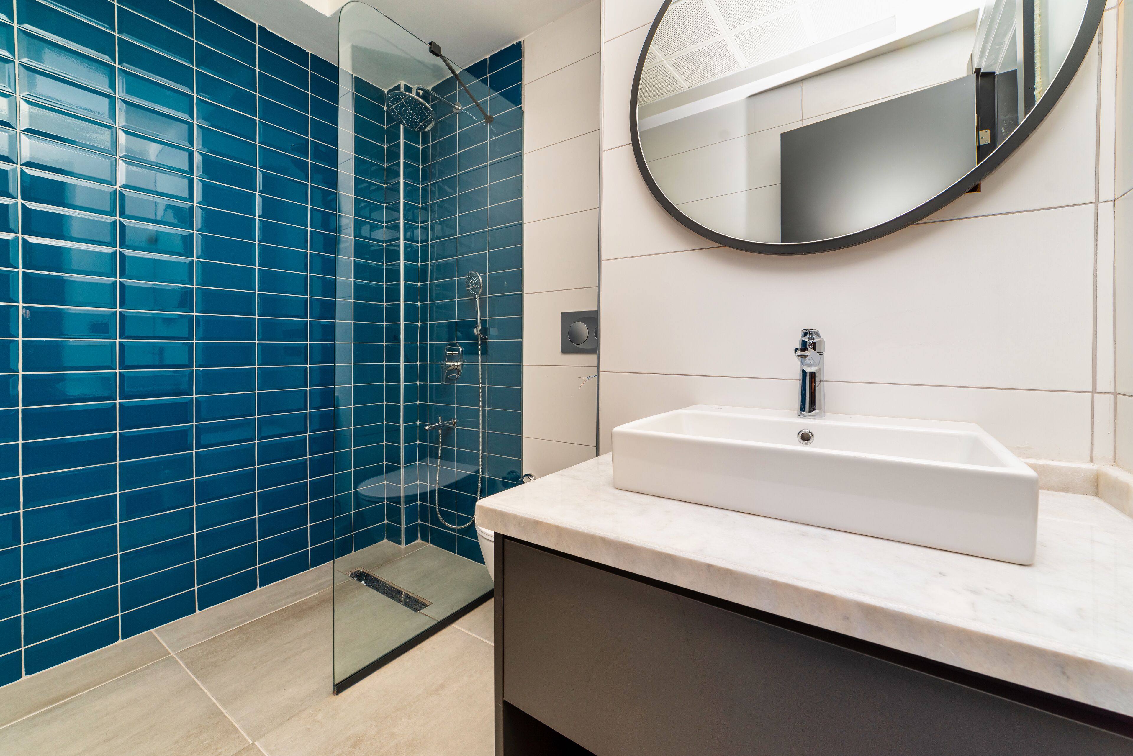 shower, designer toiletries, hair dryer, slippers