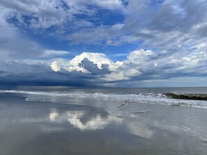On the beach, sun-loungers, beach towels