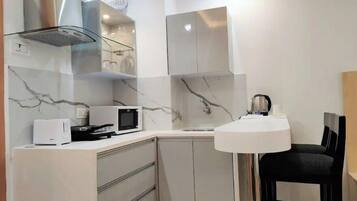 Fridge, microwave, oven, electric kettle