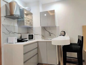 Fridge, microwave, oven, electric kettle
