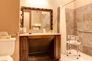 ADA Deluxe 1 King | Bathroom | Free toiletries, hair dryer, towels, soap - Wagon Wheel Hotel (West Yellowstone)