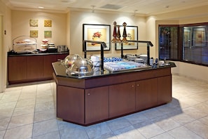 Enjoy a sumptuous spread of pastries and baked goods at our buffet.