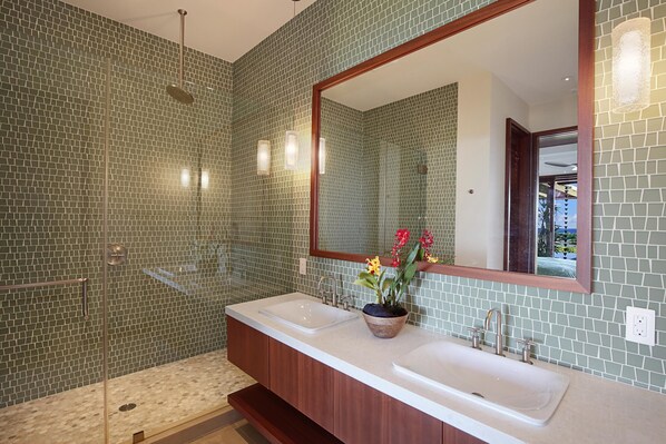A bathroom with a large mirror, two sinks, a shower, and a potted plant. - Panoramic Ocean Views From Private Gated Estate (Kaloa)