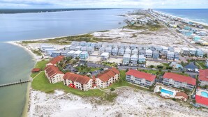 A coastal resort with beachfront properties, a swimming pool, and a pier. - Welcome to Paradise! (Navarre)