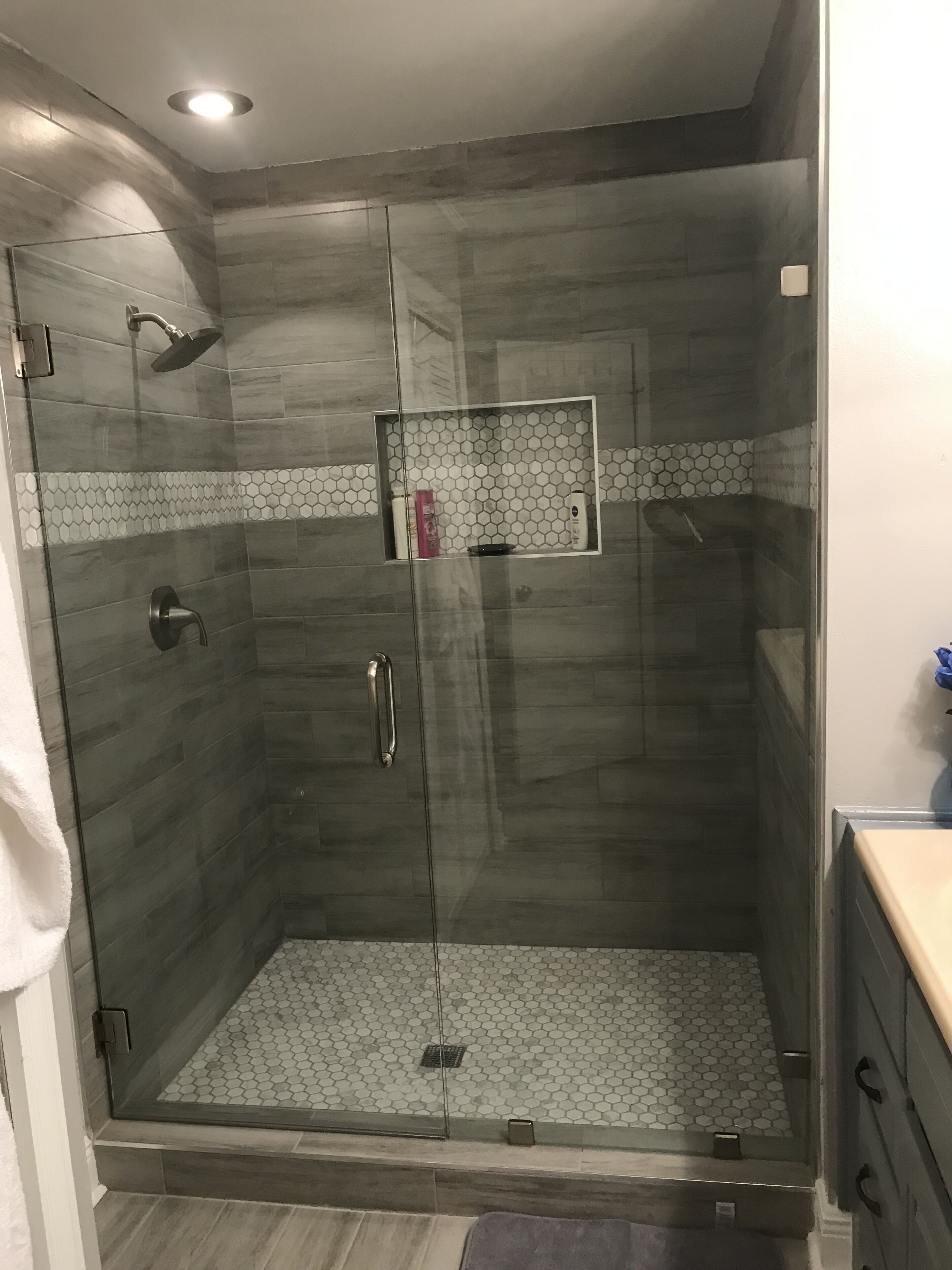 Combined shower/tub, hair dryer, towels, soap