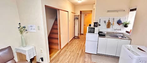 Fridge, microwave, cookware/dishes/utensils