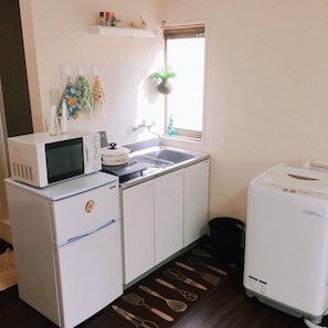 Fridge, microwave, cookware/dishes/utensils