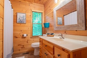 Combined shower/tub, hair dryer, towels, soap