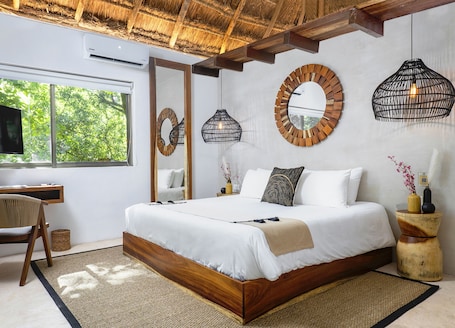 Premium bedding, down comforters, minibar, in-room safe. Terasu Riviera Maya Hotel & Spa, en Xcaret