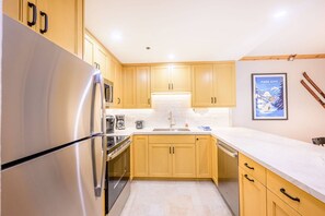 Fridge, microwave, dishwasher, coffee/tea maker