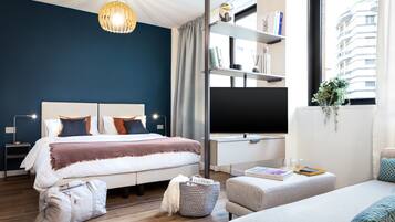 Premium bedding, down duvets, laptop workspace, blackout curtains