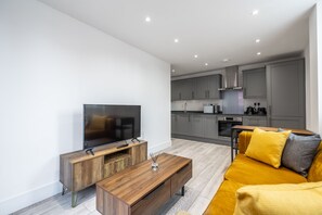 Appartement, 2 queensize bedden | Woonkamer