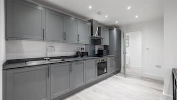 Apartment, 2 Queen Beds | Private kitchen | Fridge, microwave, oven, stovetop