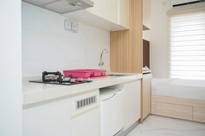Fridge, stovetop, cookware/dishes/utensils, dining tables