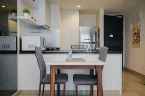 Apartamento | Área de estar | TV