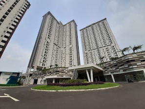 Stylish high-rise apartments with clean lines and balconies.