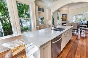 Fridge, microwave, oven, stovetop - Impeccably Restored Bungalow w/ Private Yard and Parking by Lucky Savannah (Savannah)