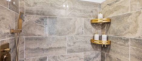Shower, hair dryer, towels, soap