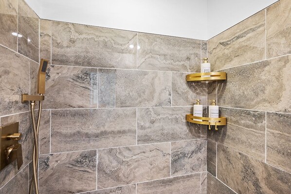 Shower, hair dryer, towels, soap