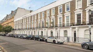 A row of terraced houses with a street in front. - Miss Westside Story - by Out of Office Lifestyle (Greater London)