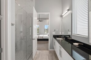 Shower, hair dryer, towels, soap