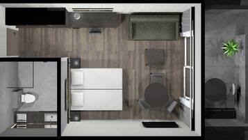 Ropa de cama hipoalergénica y caja de seguridad en la habitación