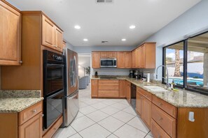 Fridge, microwave, oven, stovetop - 5BR w/4 Kings•Pool•Fire Pit•BBQ Grill•Yard Games (Phoenix)