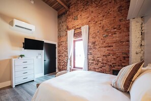 1 Bedroom Suite, Room 6 | Premium bedding, individually decorated, individually furnished, desk