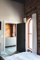 1 Bedroom Suite, Main St View, Room 9 | Premium bedding, iron/ironing board, free WiFi, bed sheets