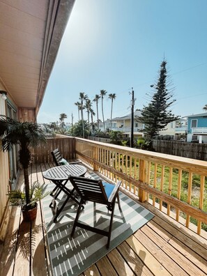 Terrace/patio - Casitas Del Lobo Palm Paradise - 2 min walk to the Bay, 7 min walk to the Ocean! (South Padre Island)